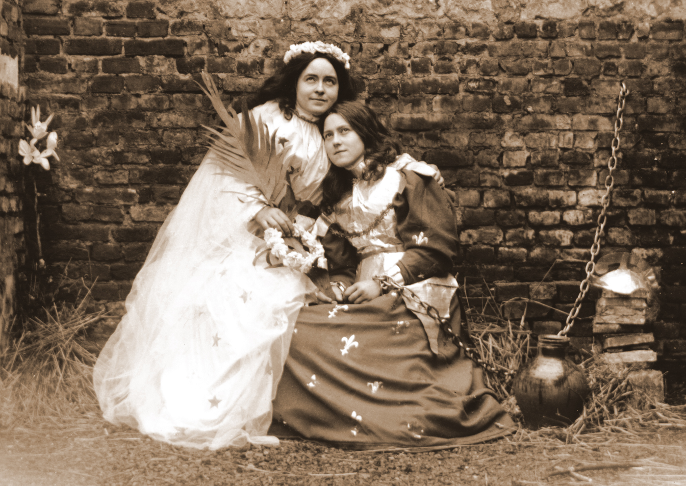 Céline Martin and St. Thérèse of Lisieux posed together before a play about Joan of Arc